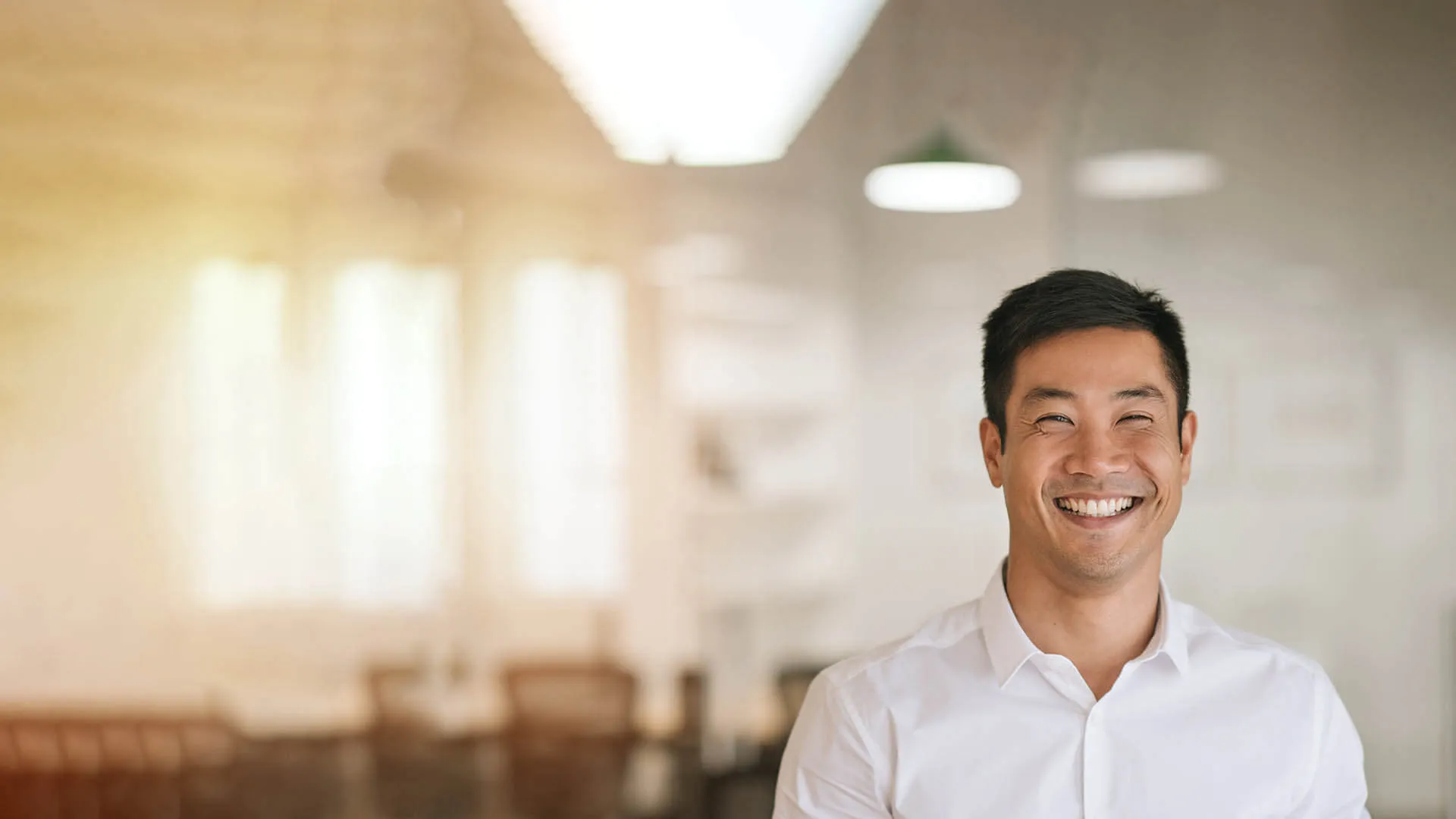 a person smiling at the camera