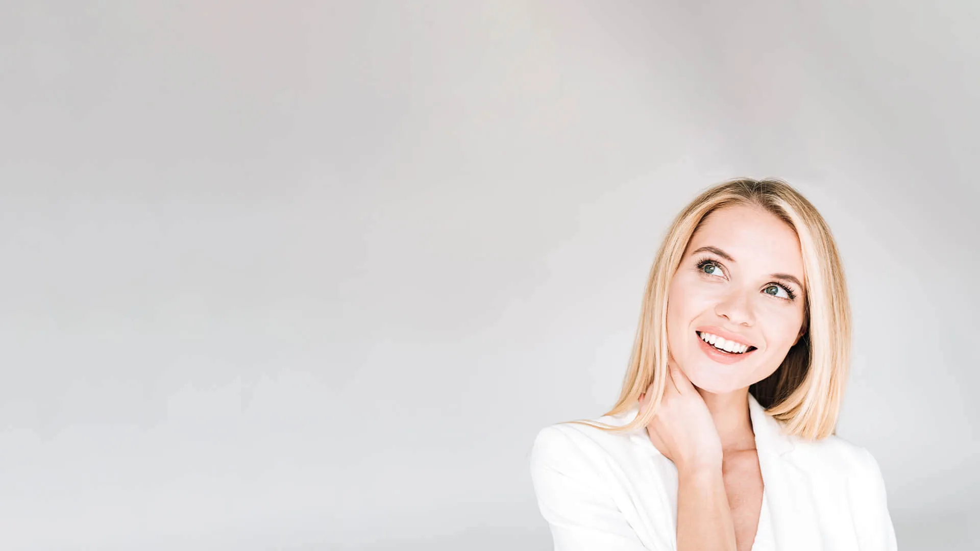 a woman smiling for the camera