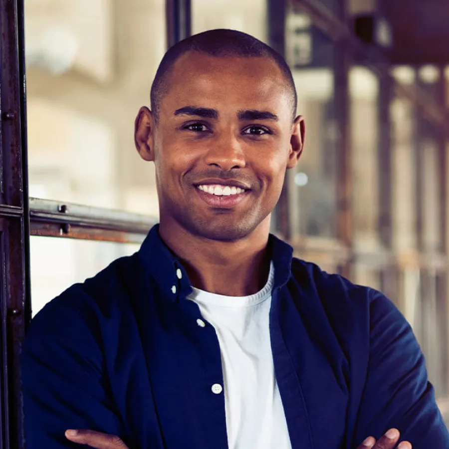 a man smiling for the camera