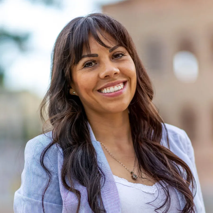 a woman smiling at the camera
