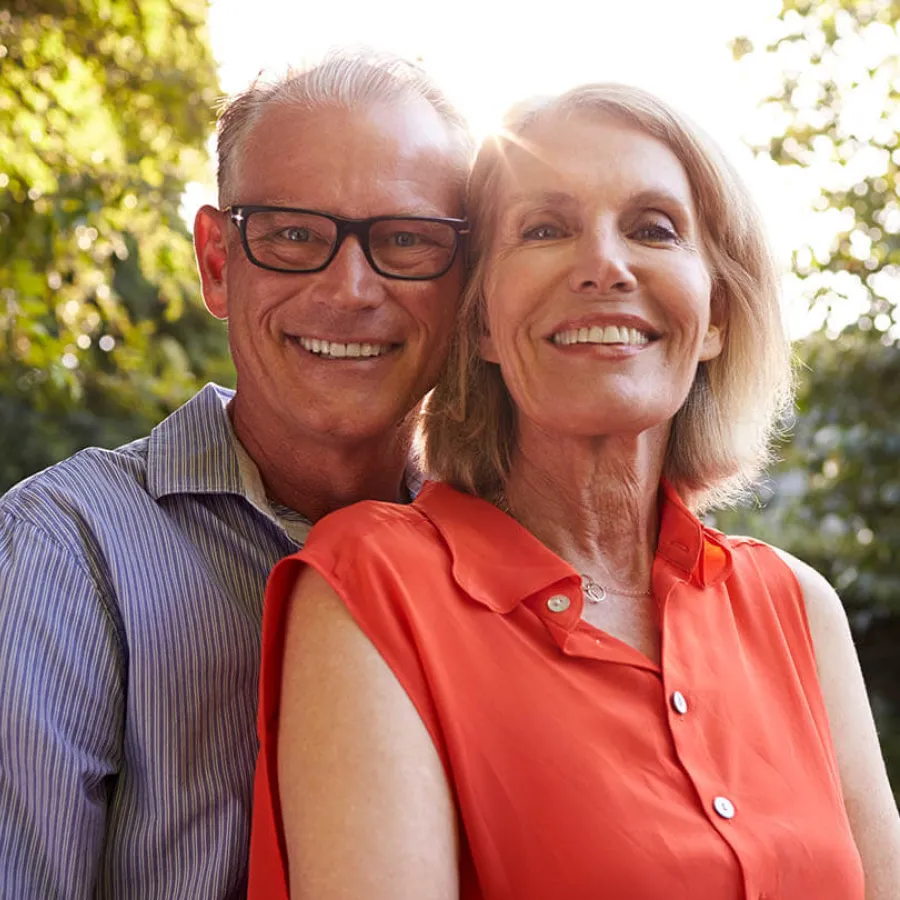 a man and woman smiling
