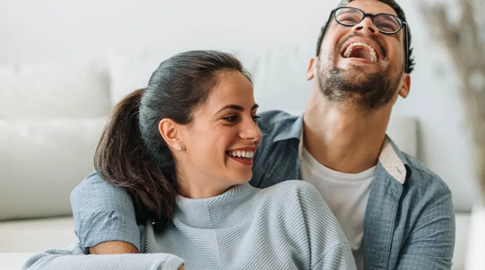 a man and woman sitting together