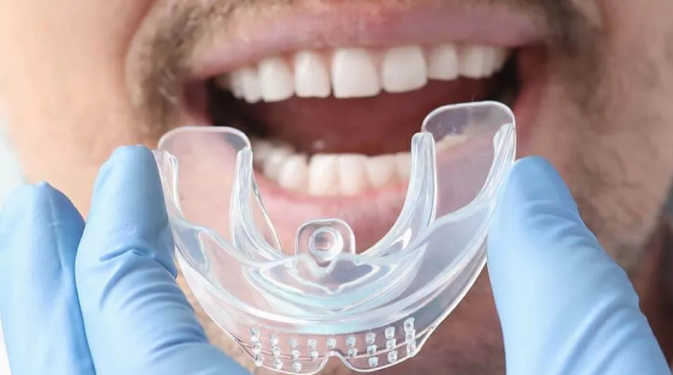 a person with a glass of water