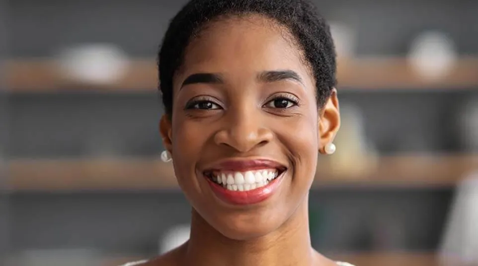 a person smiling for the camera