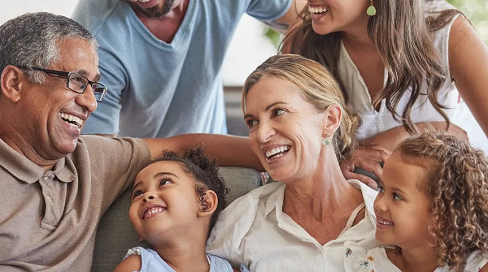 a family smiling and laughing