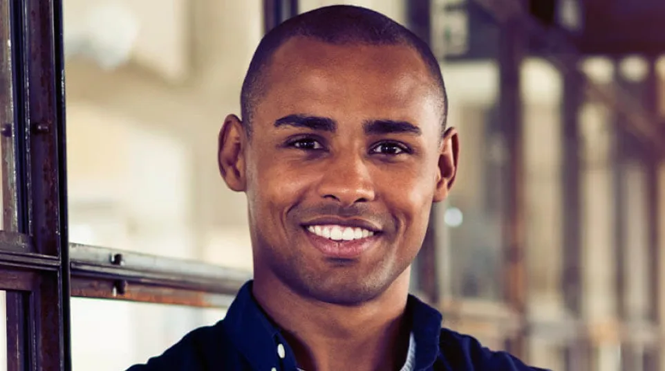 a man smiling for the camera