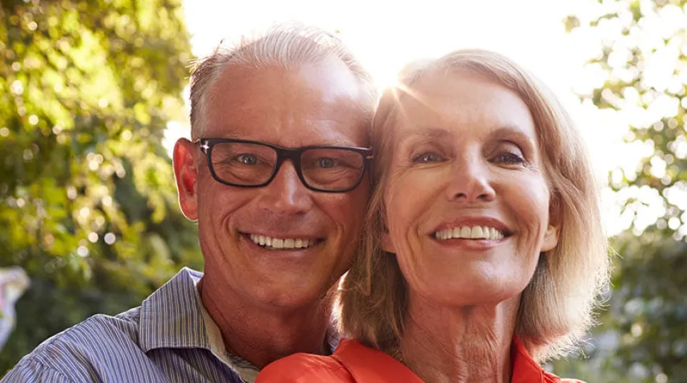a man and woman smiling